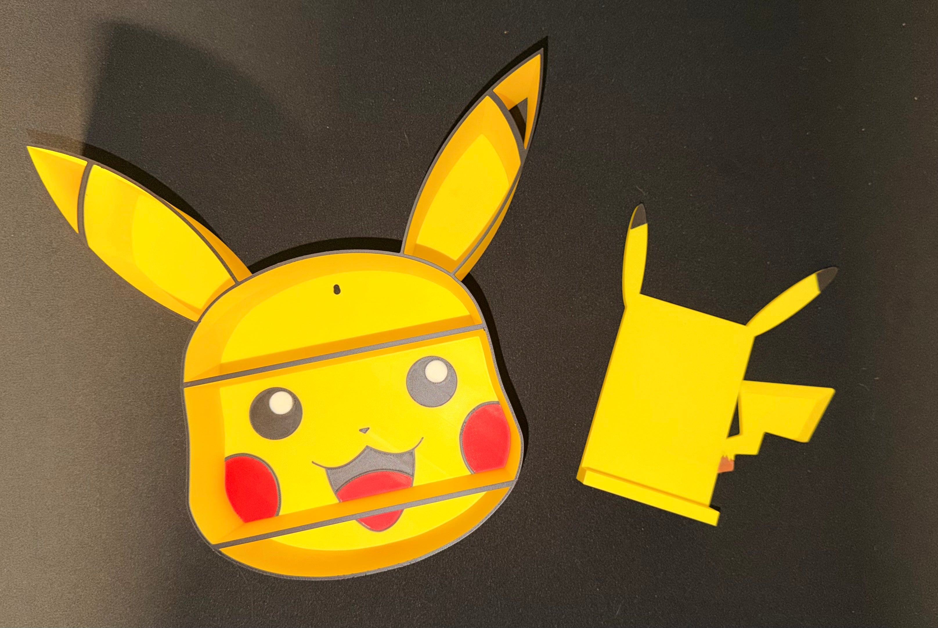 Pikachu shelf and toploader stand